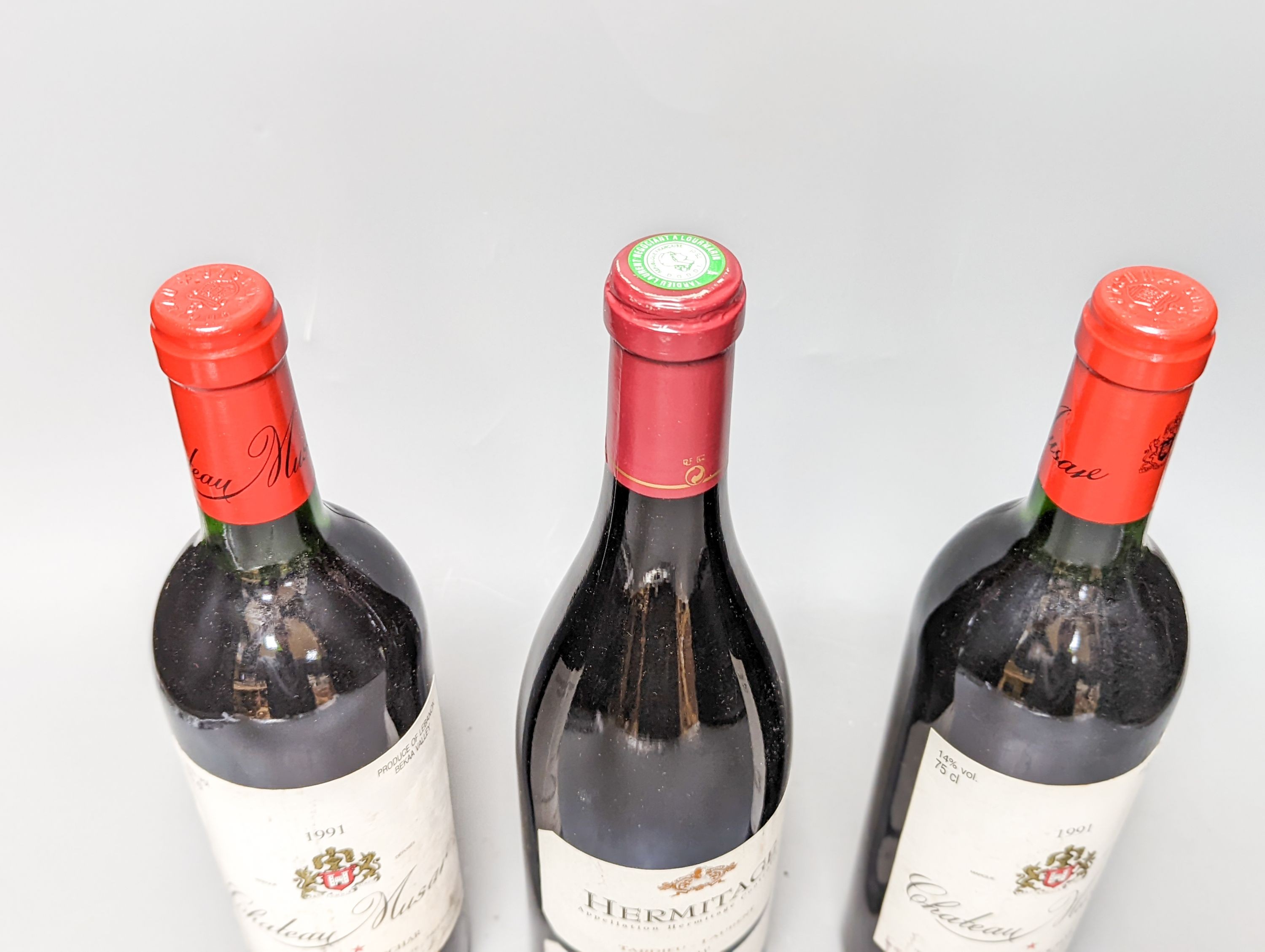 Two bottles of Chateau Musar 1991, and one bottle of Hermitage 1998